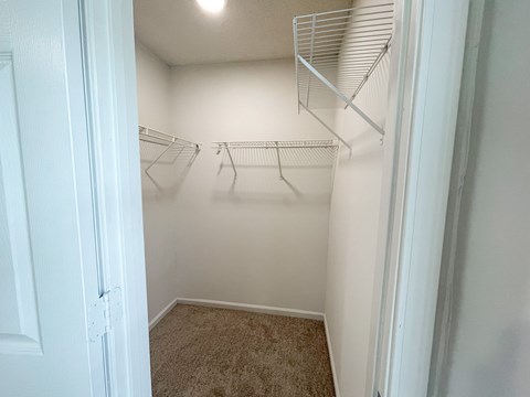 The Crest at Berkeley Lake St James renovated main bedroom walk in closet located in Duluth, GA 30096